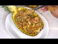 Perfect Pineapple fried rice in a pineapple bowl . Another delicious way to enjoy fried rice .