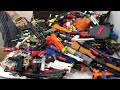 Hundreds of Toy Guns On The Bed