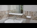 Designed Mirror Glass Installation and Fitting in the Bathroom Basin/Mirror Installation at Home