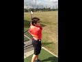 10 year old junior golfer practices with The Golf Swing Shirt.
