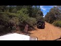 Land rover defender climbing a big hill