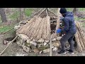 Building of a round bushcraft dugout for survival in the wild