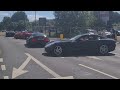 Mercedes SL65 AMG Black Series and other supercars rolling out of the Motofest