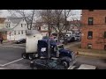 truck making tight turn on residental street