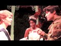 Princess Tiana gives Tommy a kiss, and Tiana and Naveen watch the castle show with him