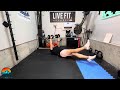 DUMBBELL OVERHEAD FLUTTER KICKS