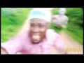african guy running away from tribe member but with sponge bob music