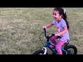 Four year old riding a bike