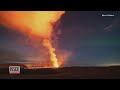 Aurora Borealis Dances Over Volcano Eruption in Iceland