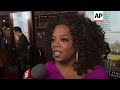 Oprah Winfrey apologises to the Swiss over media coverage of her experience in Swiss shop