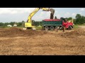 Kobelco Excavator Loading Trucks