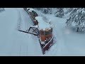 Train Plowing railroad tracks after winter storm - December 2022 - Donner Pass