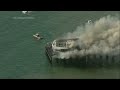 Coast Guard and fire crews battle fire on California pier