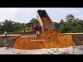 Fantastic techniques At Complex By Komatsu Dozer Pushing To Water And 25 Ton Dump Truck Dumping Dirt