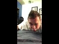 Stretching shoulder on bed shoulder surgery recovery