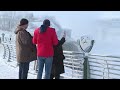 Aerial footage shows partially frozen Niagara Falls