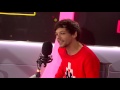 Louis Tomlinson Reads The Weirdest Rumours About Him Online In 'Lou Or False?' | PopBuzz Meets