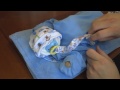 How to Make a Sleeping Baby out of Diapers - DIY diaper cake tutorial