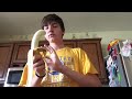 Just me eating a banana and drinking an orange soda