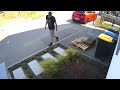 Man Picks Up Trash with Hands as Garbage Bag Tears Apart - 1500514