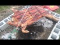 Cooking pork Asando lechon  new years 2014 part 2