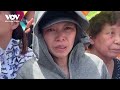 Dòng người đội nắng đứng hai bên đường tiễn biệt Tổng Bí thư Nguyễn Phú Trọng | Báo Điện tử VOV