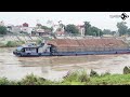 Giant Barge Loaded with Wood Chips