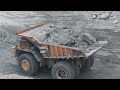Loading Big Chunks of Rocks Liebherr R9350 Excavator Loading the Dump Truck With Big Copper Rocks